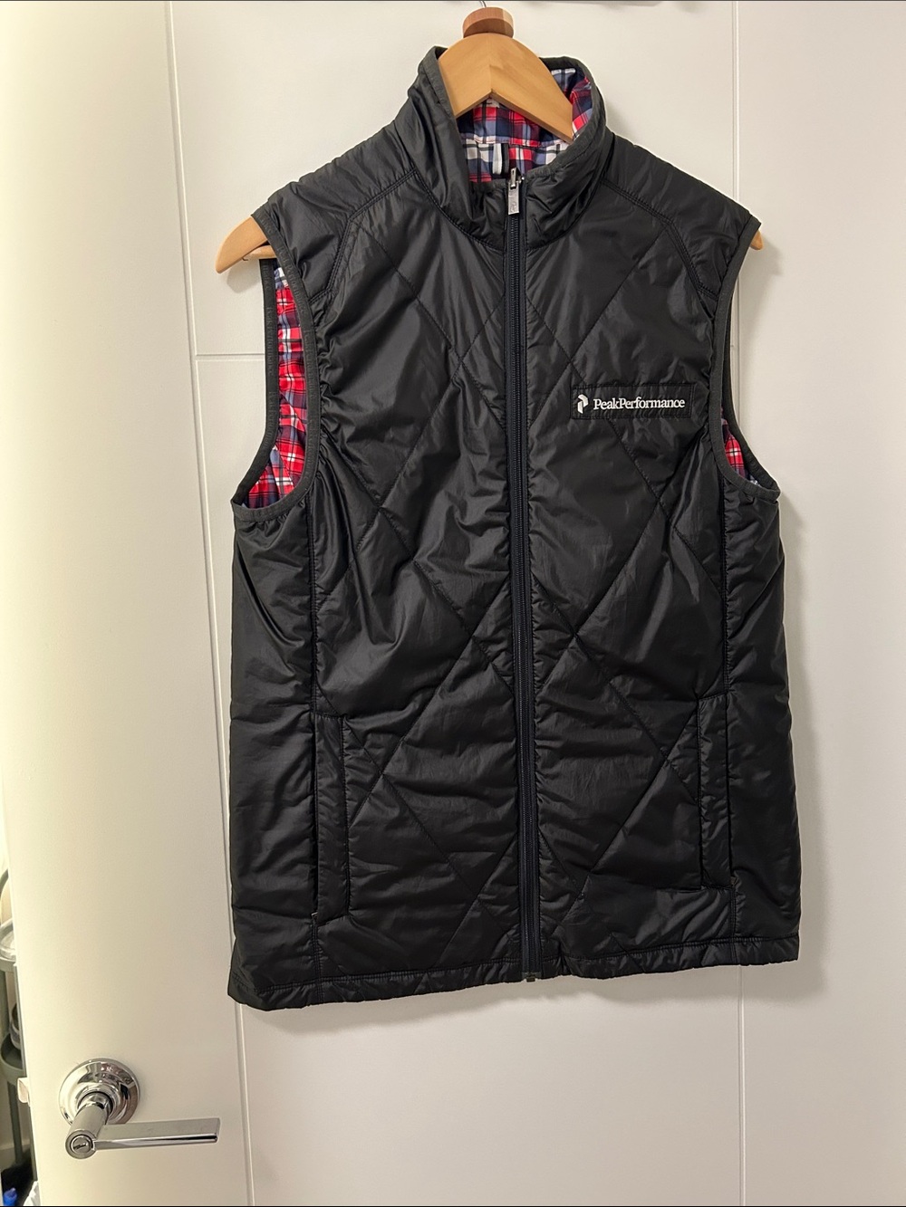 Peak Performance Black Quilted Vest with Red Plaid Lining